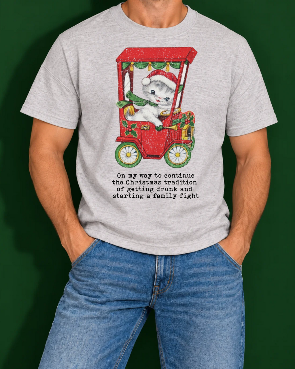 Christmas Family Fight Tradition | Funny Men's Christmas Graphic Tee shown in ash on a male model