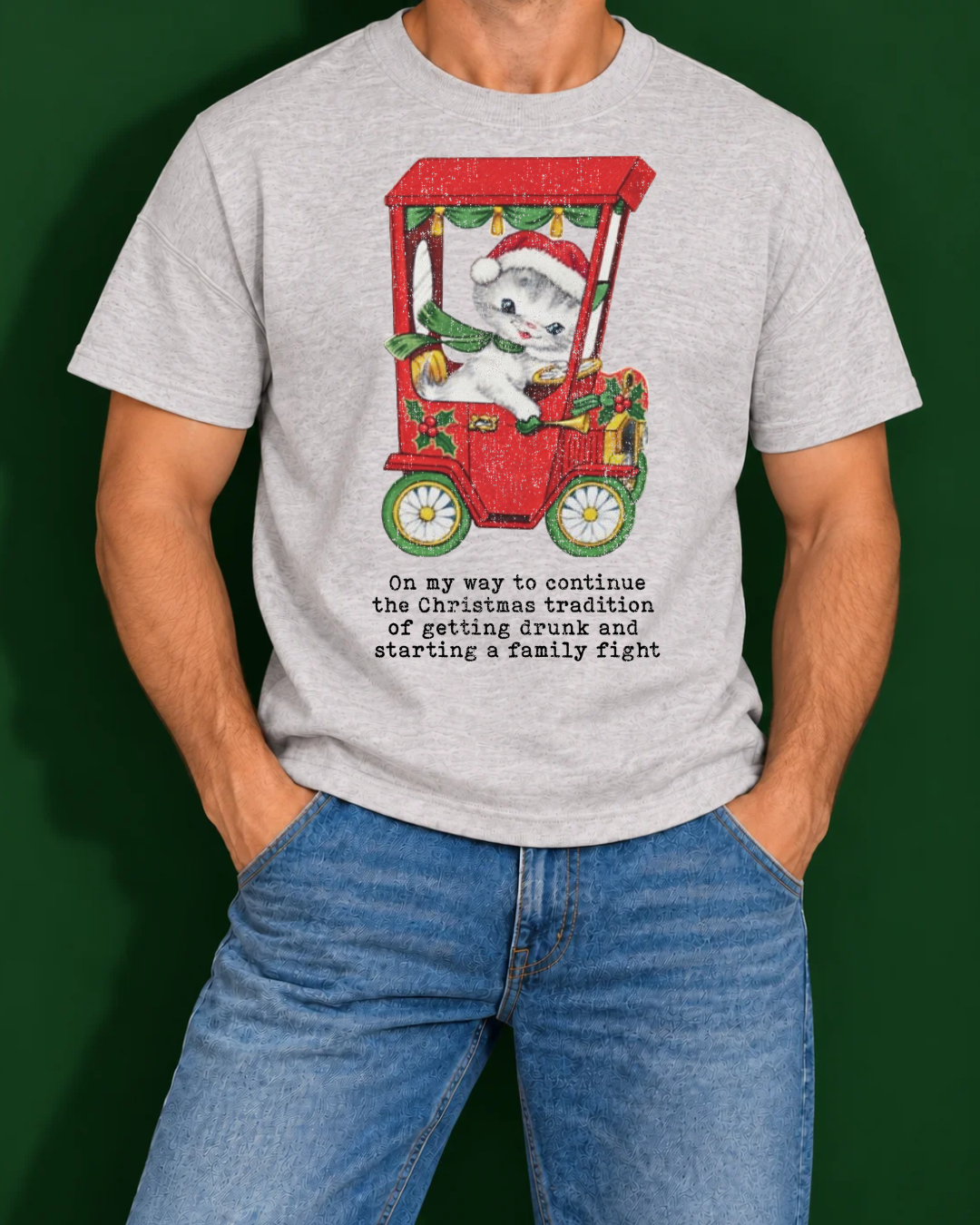 Christmas Family Fight Tradition | Funny Men's Christmas Graphic Tee shown in ash on a male model