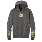 Charcoal winter cottage Christmas hoodie front and festive woodland sleeves