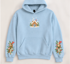 Light blue Woodland Christmas Cottage hoodie with small cottage chest print and matching woodland holiday sleeve artwork
