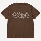 Brown Comfort Colors Espresso tee with smaller gingerbread friends graphic front
