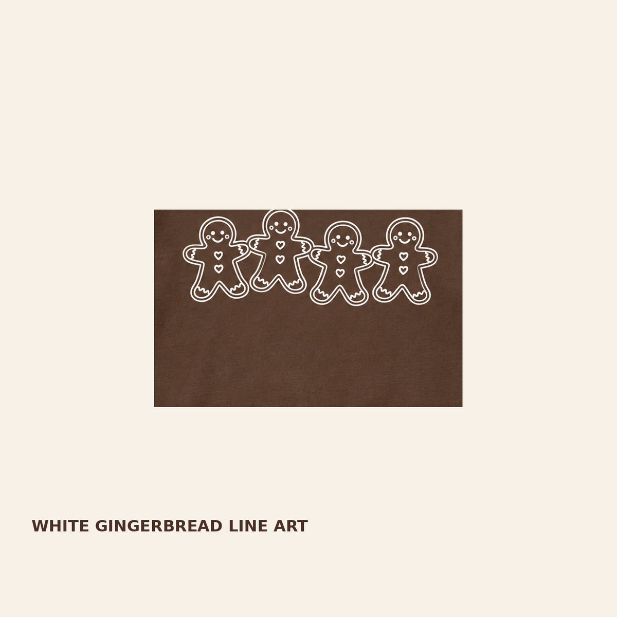 Close-up of white gingerbread friends graphic on Comfort Colors 1717 Espresso tee