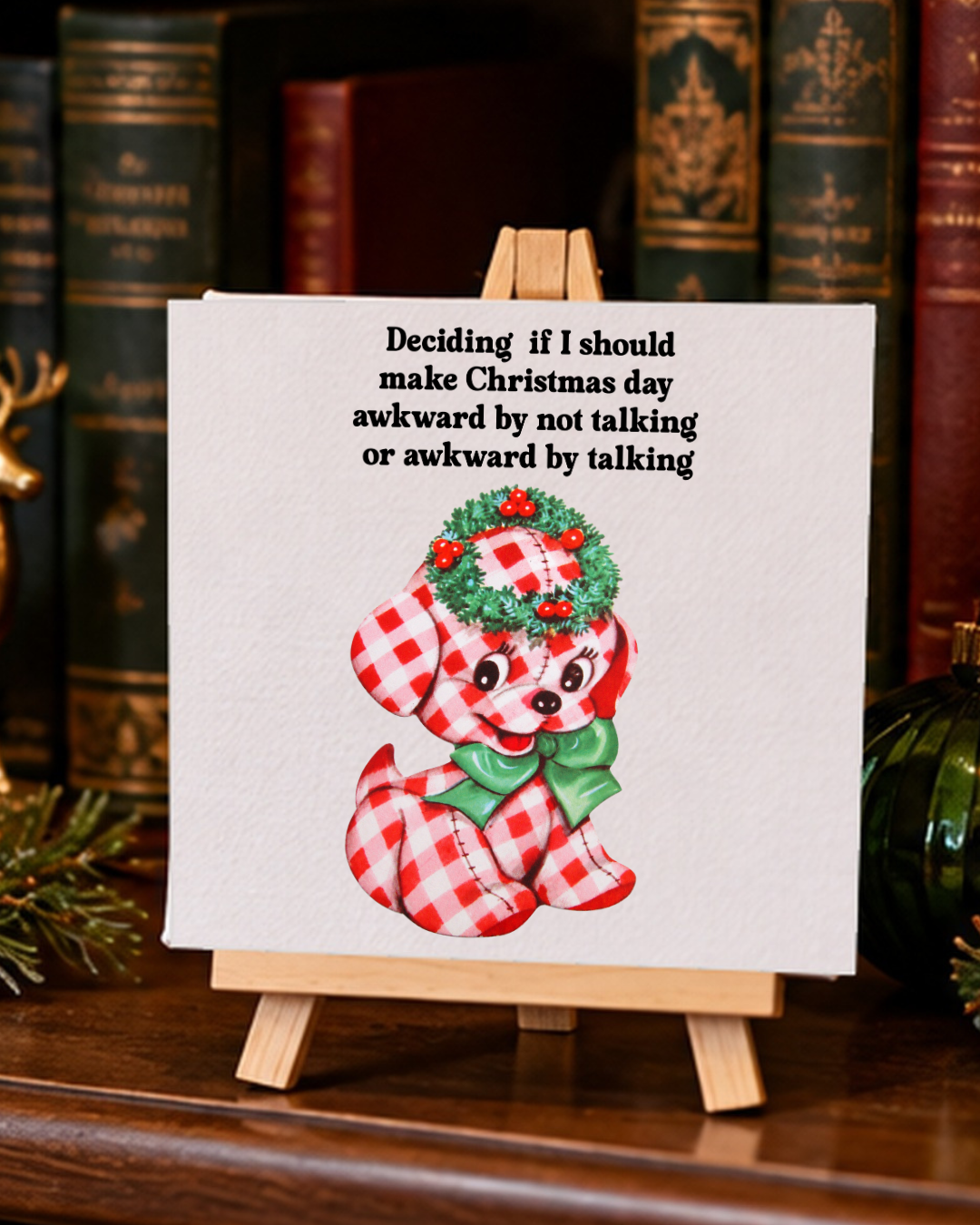 Funny Christmas mini canvas on bookshelf