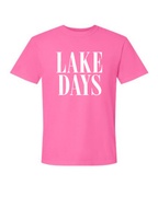 Pink t-shirt with 'LAKE DAYS' text on a white background