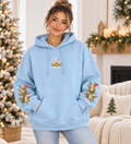 Woodland Christmas Cottage | Gildan Holiday Hoodie — Light Blue or Charcoal