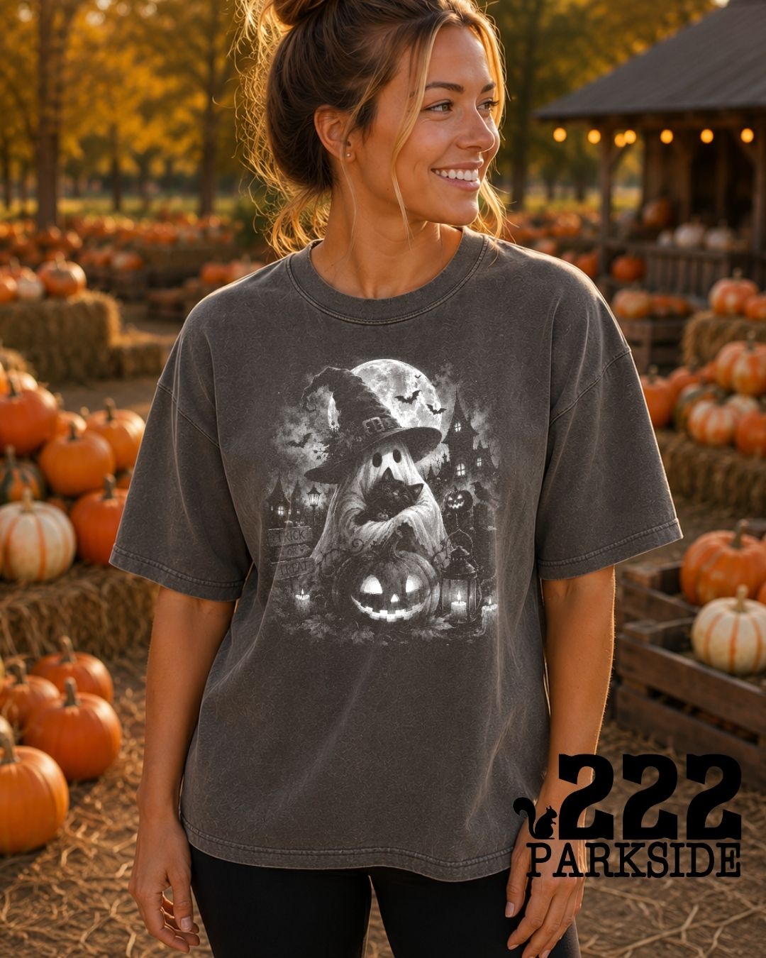 Witch hat ghost with black cat and jack-o-lantern Comfort Colors tee at a pumpkin patch