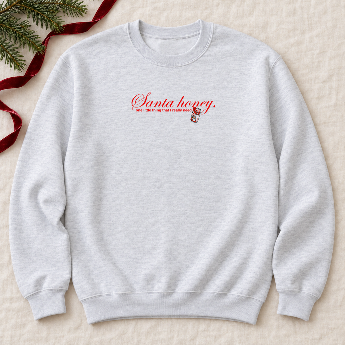 Santa Honey Ash Gildan crewneck with original artwork, flat lay