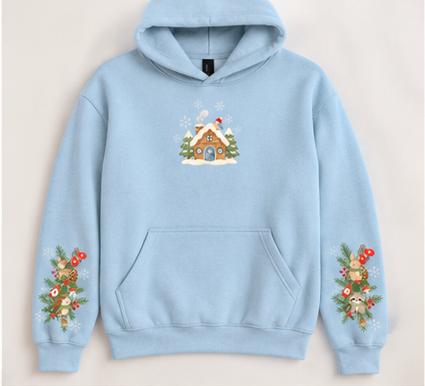 Woodland Christmas Cottage | Gildan Holiday Hoodie — Light Blue or Charcoal
